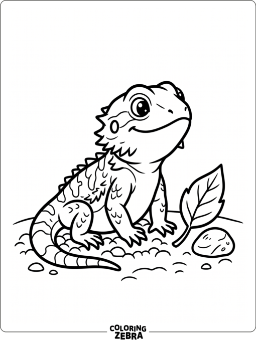 A baby bearded dragon beside a leaf and pebble