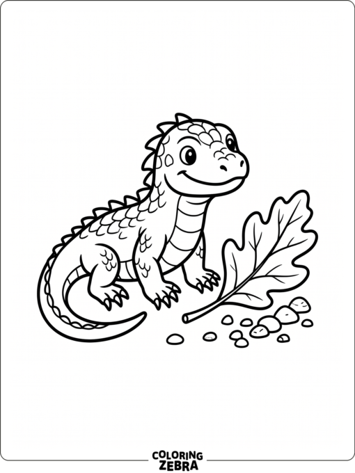 A baby komodo dragon beside a leaf and stones