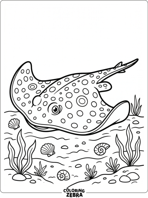 A spotted stingray resting on the seabed