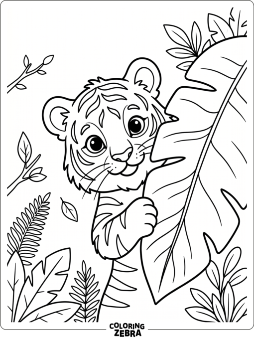 A cute baby tiger peeking from behind a leaf