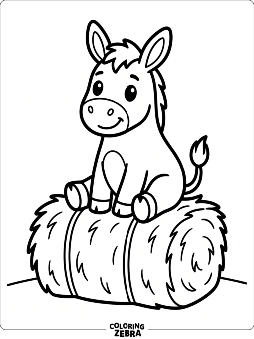 A cute donkey sitting on a hay bale