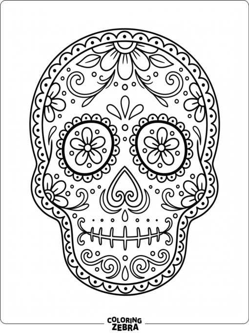 Decorated sugar skull cookie on a plate