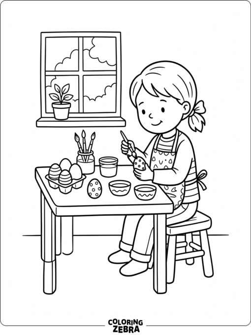 A child painting Easter eggs at a table