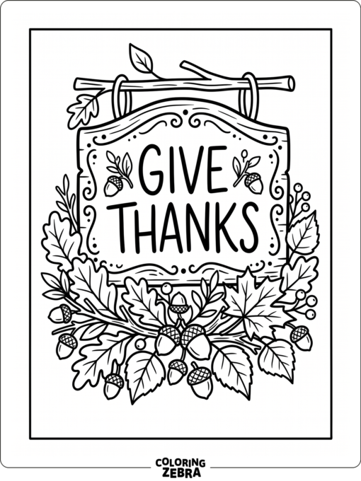 A Give Thanks sign with leaves and acorns