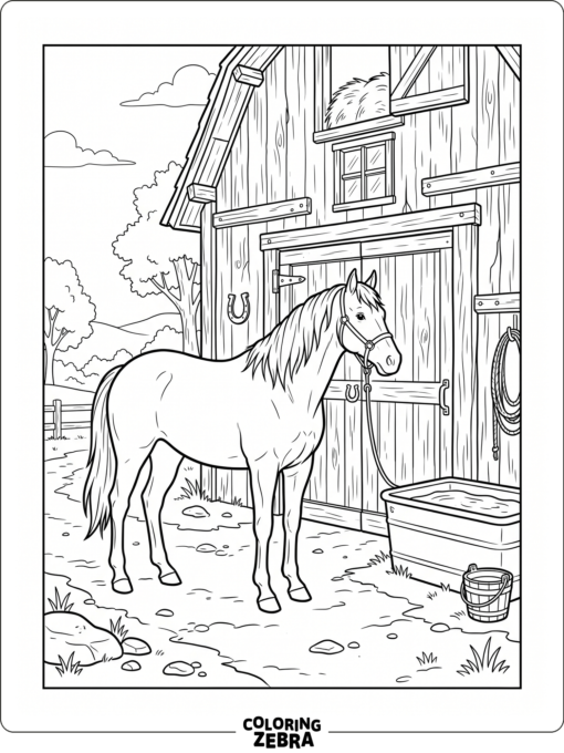A horse standing by a barn and water trough