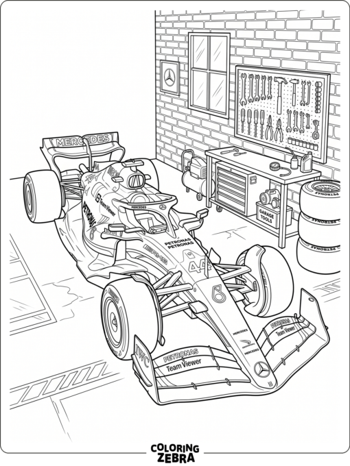 A Mercedes style formula car beside a garage wall