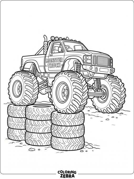 Monster truck with oversized tires near a tire wall