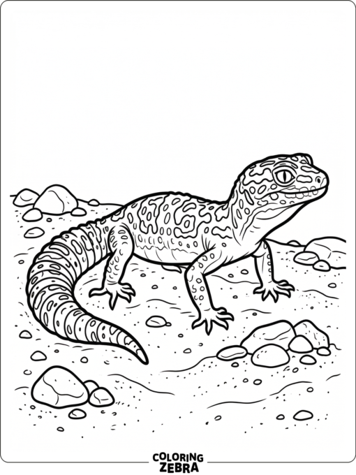 A realistic leopard gecko rests on sand near pebbles