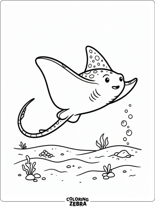 A stingray gliding over the ocean floor with bubbles